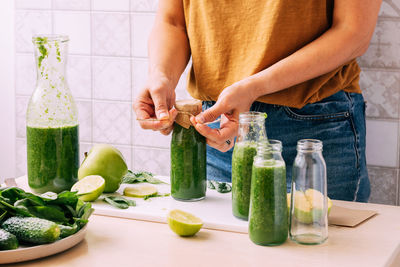 Midsection of man preparing food