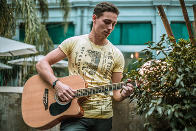 Young man playing guitar