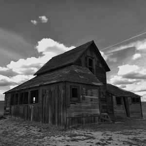 Exterior of house against cloudy sky