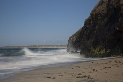 Scenic view of sea against clear sky