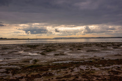 Scenic view of sea against sky during sunset