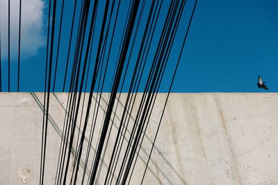 Low angle view of building against blue sky