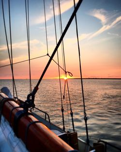 Close-up of sea against sky during sunset