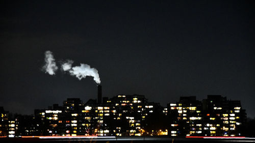 Illuminated cityscape at night