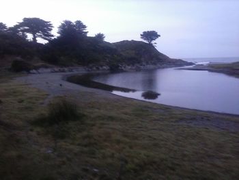 Scenic view of river against clear sky