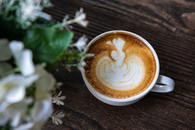 Close-up of cappuccino on table