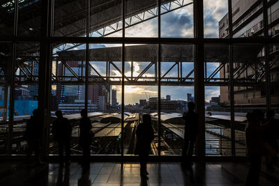 Railroad station platform seen through window