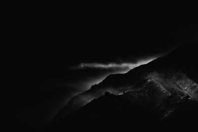 Silhouette of mountain at night