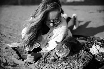 Woman sitting in cat