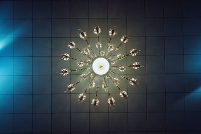 Low angle view of illuminated chandelier