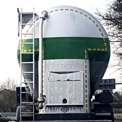 Close-up of vintage car against sky