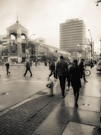 People walking on city street
