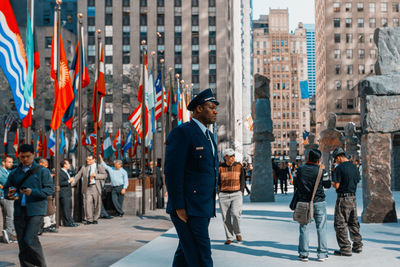 Group of people walking in city