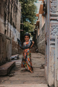 Portrait of smiling girl in traditional clothing