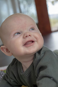 Close-up of cute baby on bed