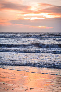 Scenic view of sea against sky during sunset