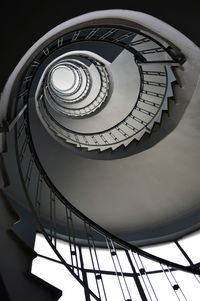 Directly below shot of spiral staircase in building