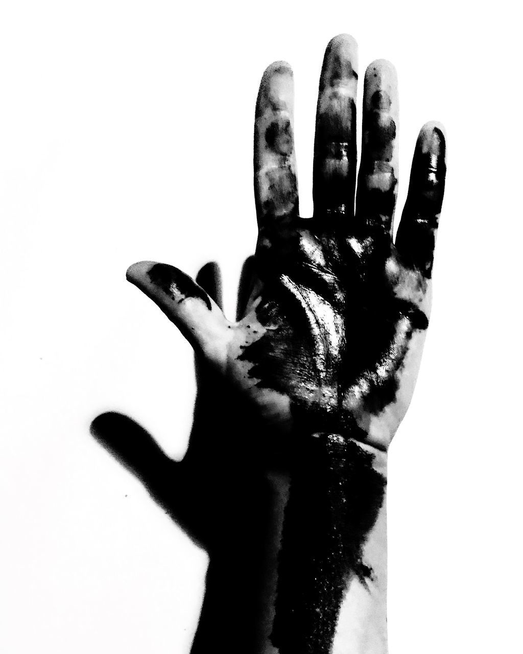 CLOSE-UP OF PERSON HAND AGAINST WHITE BACKGROUND