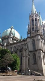 High angle view of church against blue sky