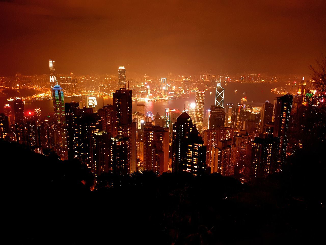 AERIAL VIEW OF ILLUMINATED CITYSCAPE