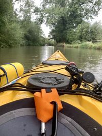 Close-up of nautical vessel on lake