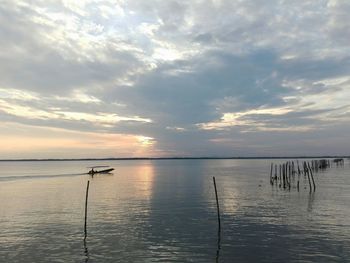 Scenic view of sea against sky at sunset