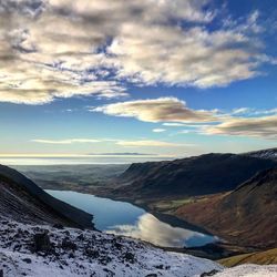 Scenic view of mountains against sky during winter