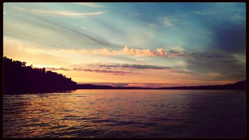 Scenic view of sea at sunset