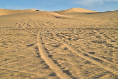 Scenic view of desert against sky