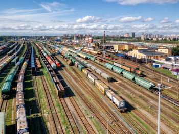 Aerial view of railway terminal. freight wagons with goods on railroad station. cargo transportation