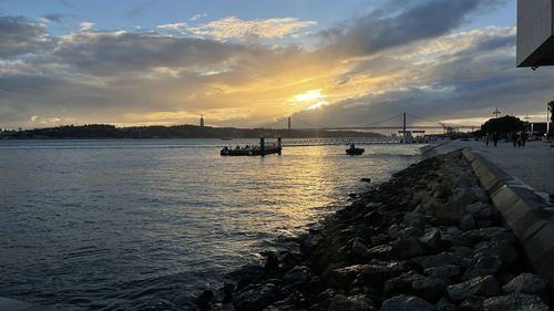 Scenic view of sea against sky during sunset