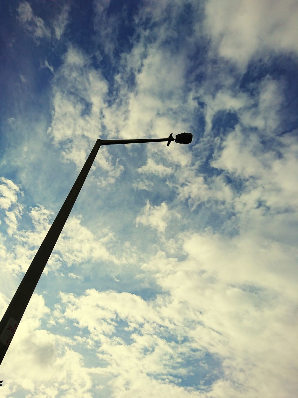 LOW ANGLE VIEW OF SILHOUETTE STREET LIGHT AGAINST SKY