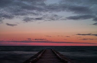 Scenic view of sea at sunset