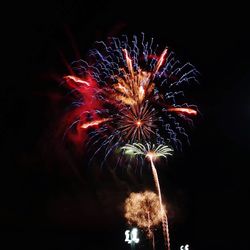 Low angle view of firework display