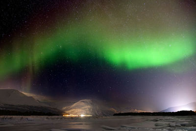 Scenic view of sea against sky at night