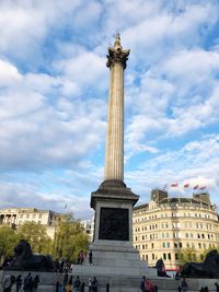 Low angle view of statue against cloudy sky