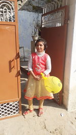 Portrait of girl standing outdoors