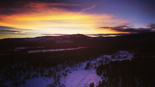 Scenic view of dramatic sky during sunset