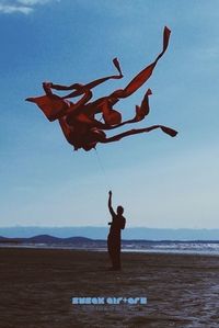 Woman jumping in sky