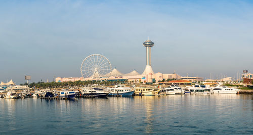 View of ferris wheel at harbor