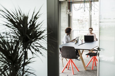 Two women working in an office