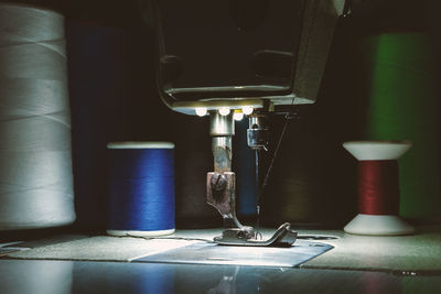 Close-up of illuminated sewing machine 