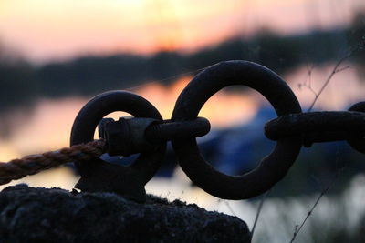 Close-up of chain against sky