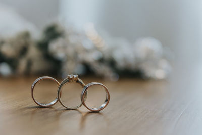 Close-up of rings on table