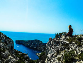 Scenic view of sea against clear blue sky