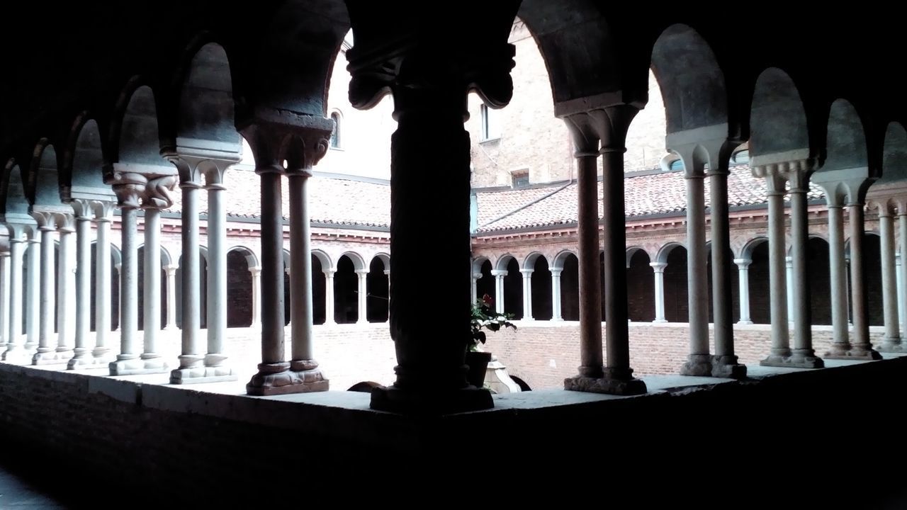 VIEW OF COLONNADE AND BUILDING