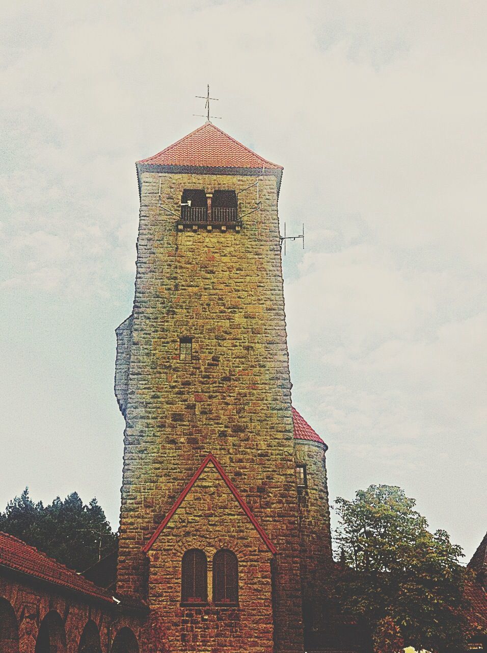 architecture, building exterior, built structure, low angle view, religion, place of worship, tower, sky, spirituality, church, history, tree, outdoors, day, castle, no people, cloud - sky, exterior