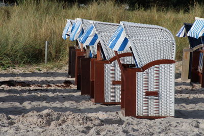 Hooded chairs on beach