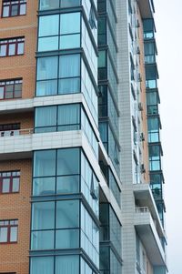 Low angle view of modern building against sky