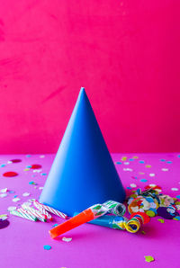 High angle view of multi colored paper on table